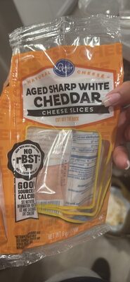 AGED SHARP WHITE CHEDDAR CHEESE SLICES