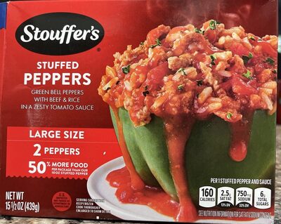 Large size stuffed green bell peppers hand-filled with beef & rice in a zesty tomato sauce