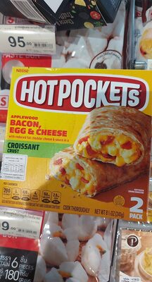 Applewood bacon, egg & cheese with reduced fat cheddar cheese & sauce in a croissant crust sandwiches, applewood bacon, egg & cheese