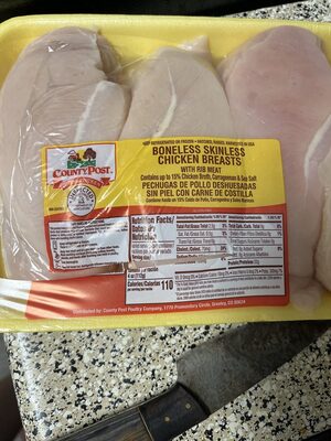 Boneless skinless chicken breast with rib meat uncooked
