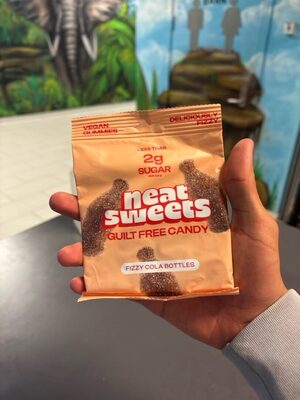 neat sweets fizzy cola bottles