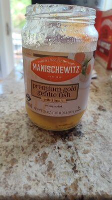 Premium gold gefilte fish with carrots in jelled broth