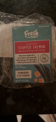 SEAFOOD STUFFED SALMON WITH ASPARAGUS AND GARLIC PARMESAN BUTTER