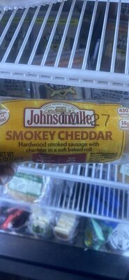 SMOKEY CHEDDAR Hardwood smoked sausage with cheddar in a soft baked roll