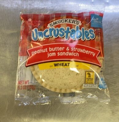 Uncrustables peanut butter & strawberry jam sandwich