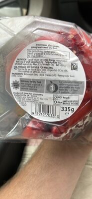 WATERMELON BLACK GRAPE & POMEGRANATE SALAD WITH LIME WEDGES